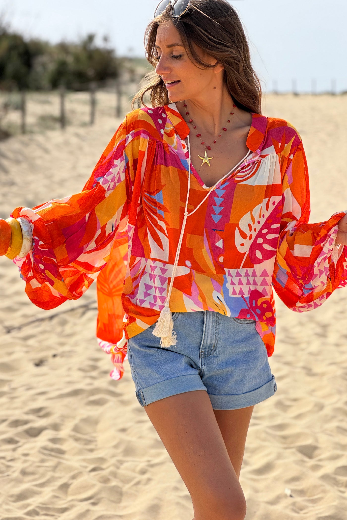 Blouse fluide imprimé graphique orange manches bouffantes