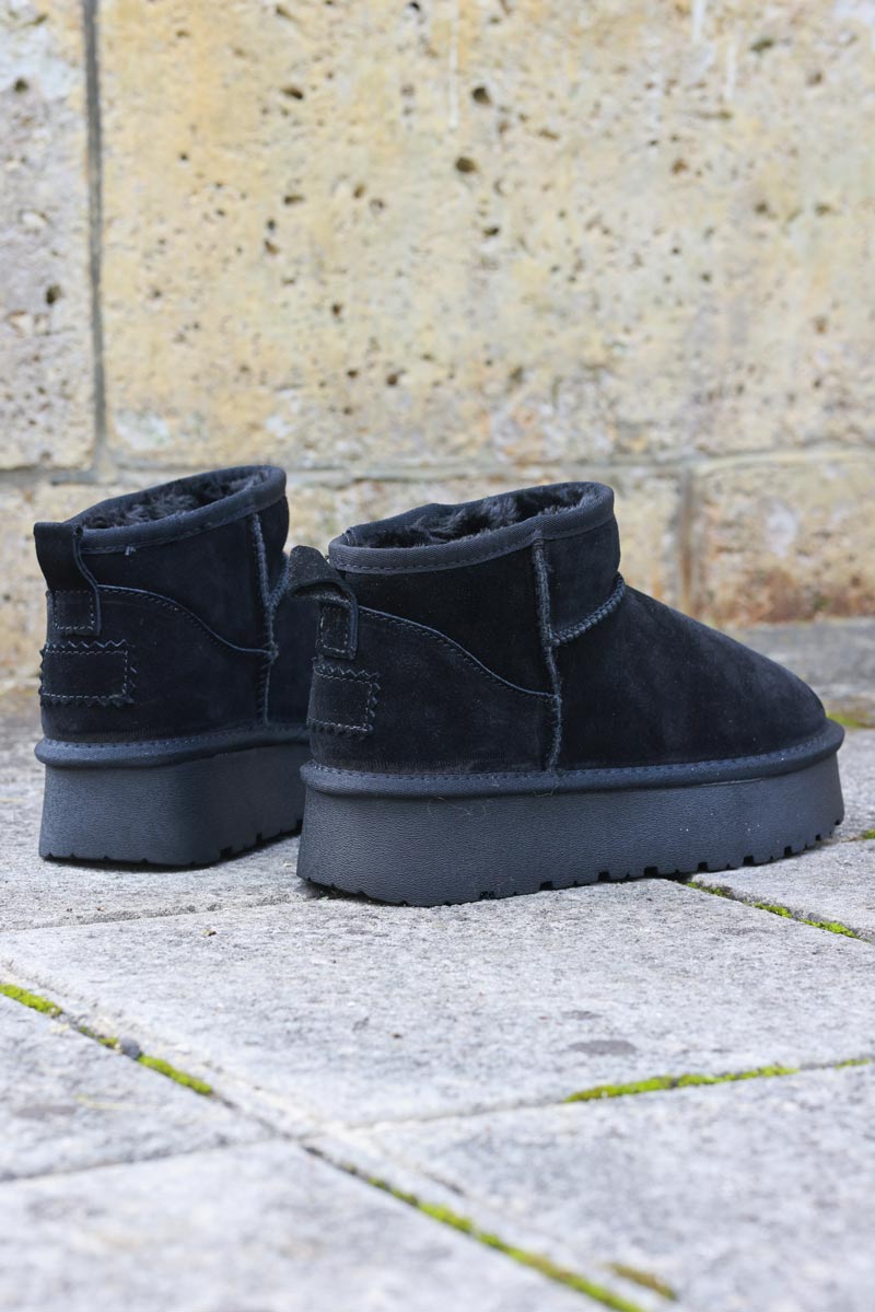 Botas bajas de piel con plataforma forradas en pelo negras