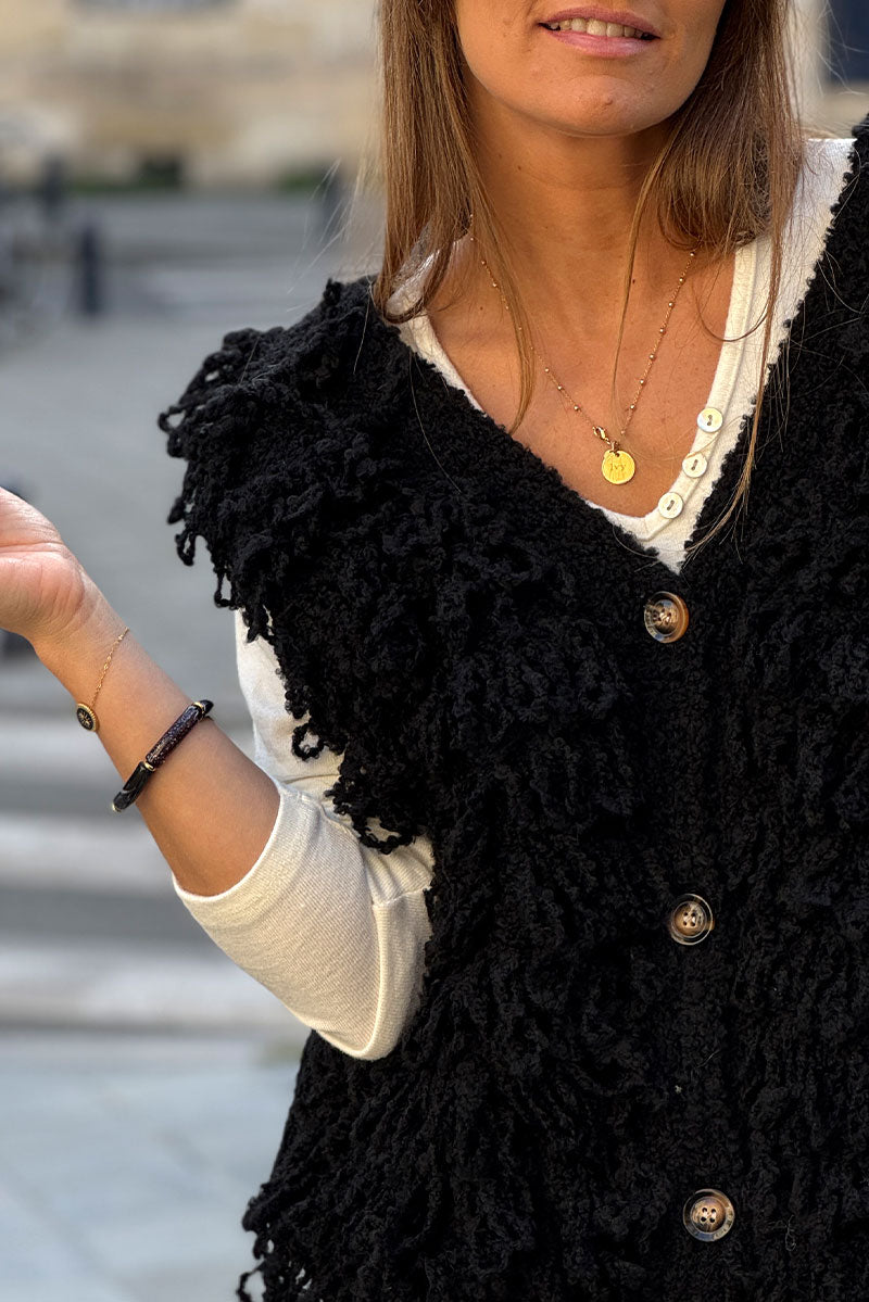 Pulsera pequeña de malla dorada con ojos negros