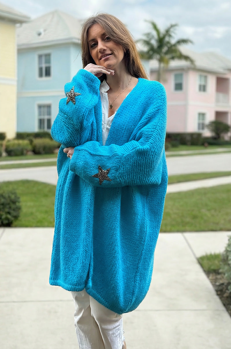 Gilet turquoise mi long grosses mailles étoile strass manches