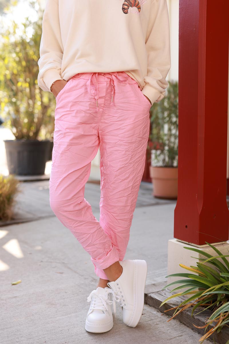 Pink comfort and stretch fabric pants with a glitter star