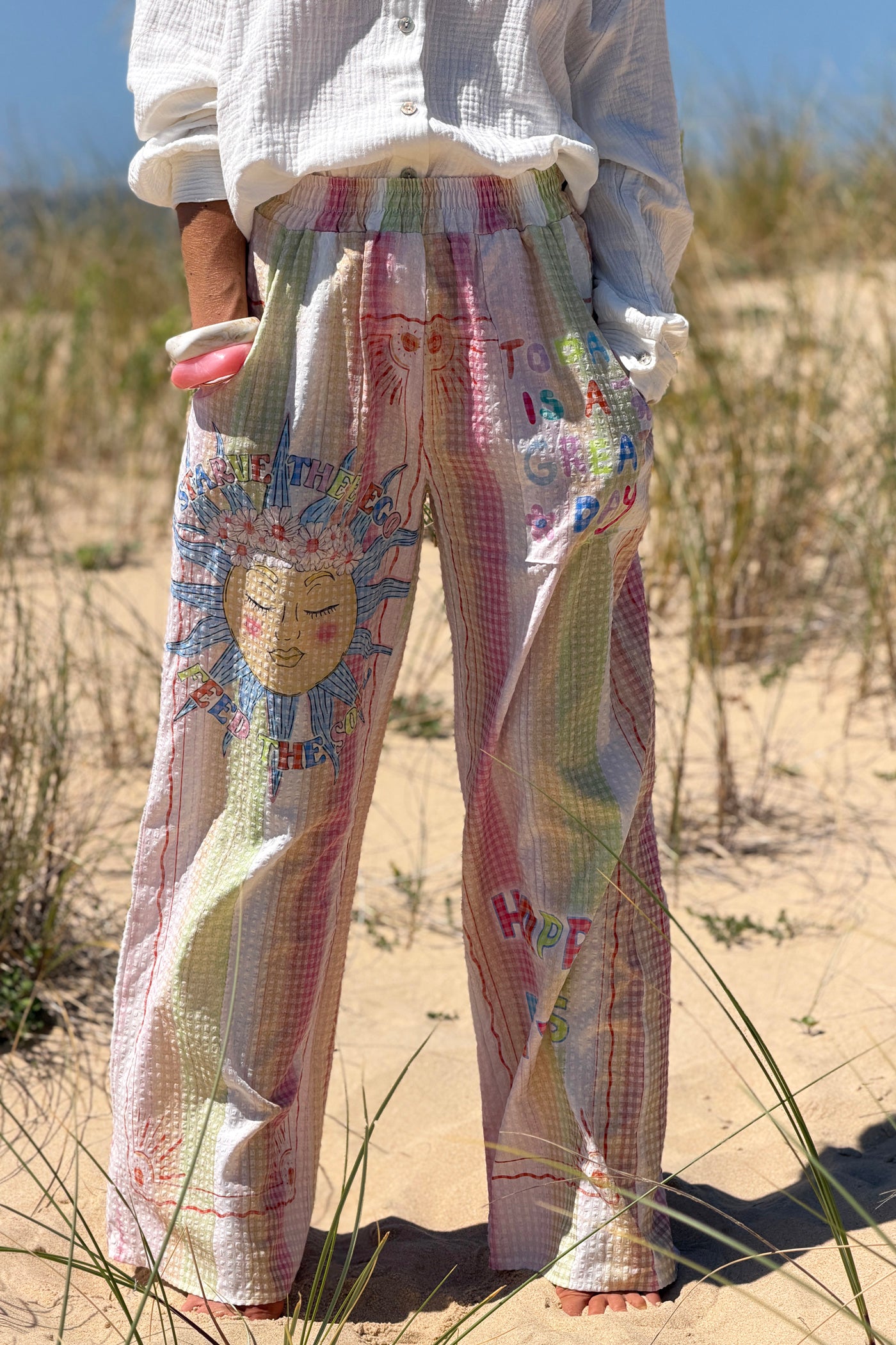 Pantalon large en seersucker rose motif soleil fleuri Happy Days taille élastique