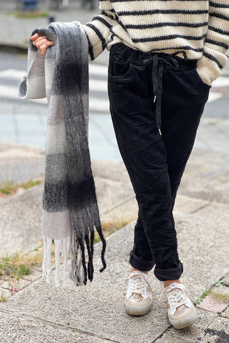 Pantalon stretch noir et confort en velours côtelé à taille élastique
