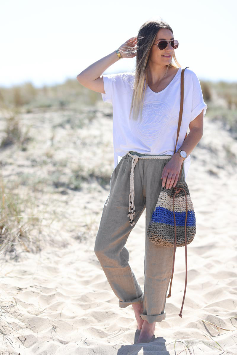 Khaki linen trousers with crochet and wooden beaded belt