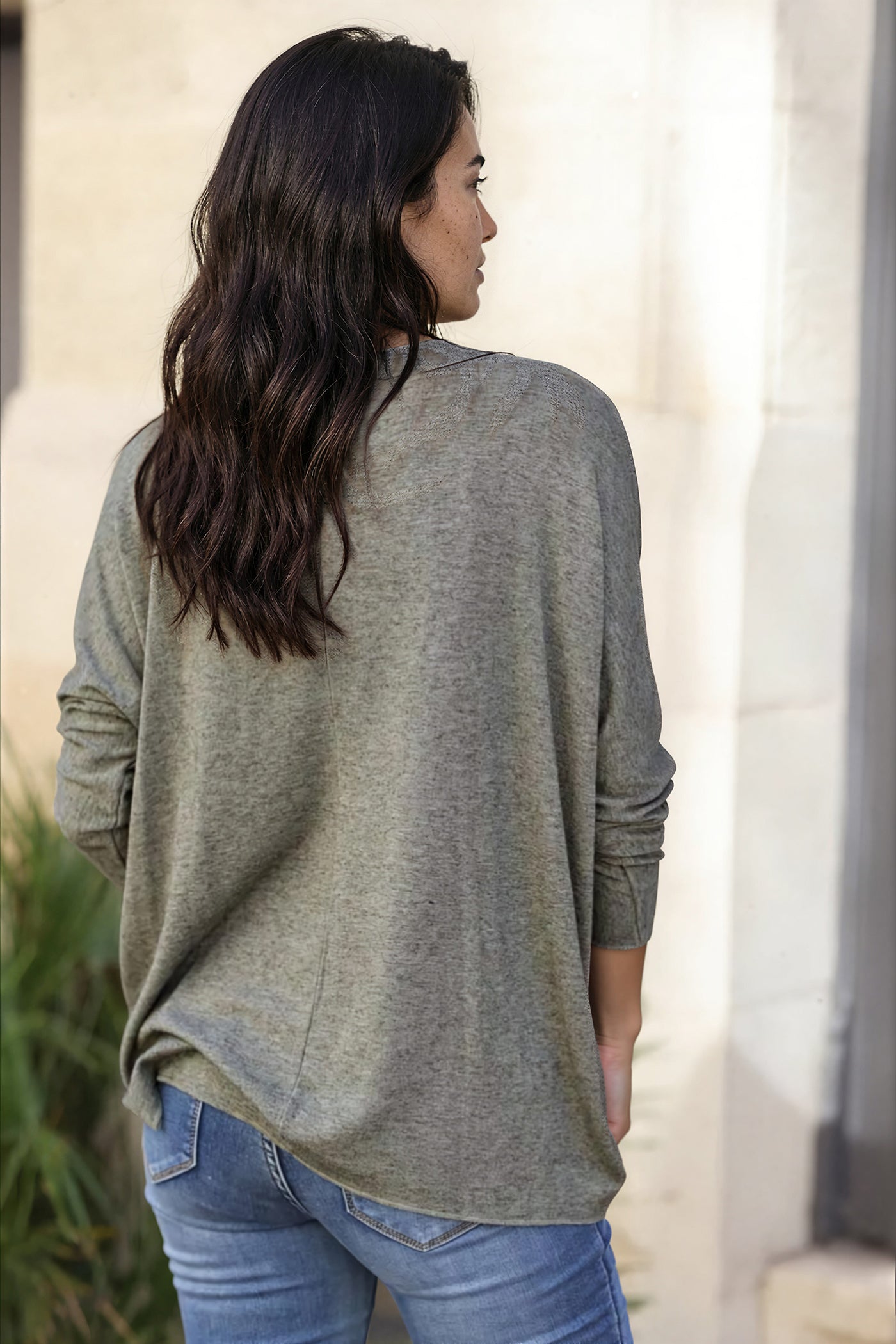 Khaki v-neck sweater with small sequin star
