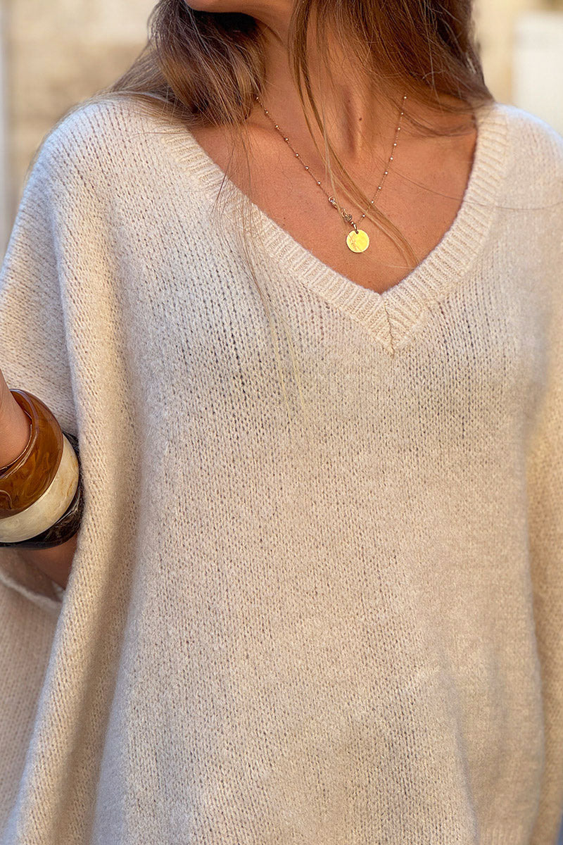 Pull sans manches large et moelleux beige en mohair col v côtelé