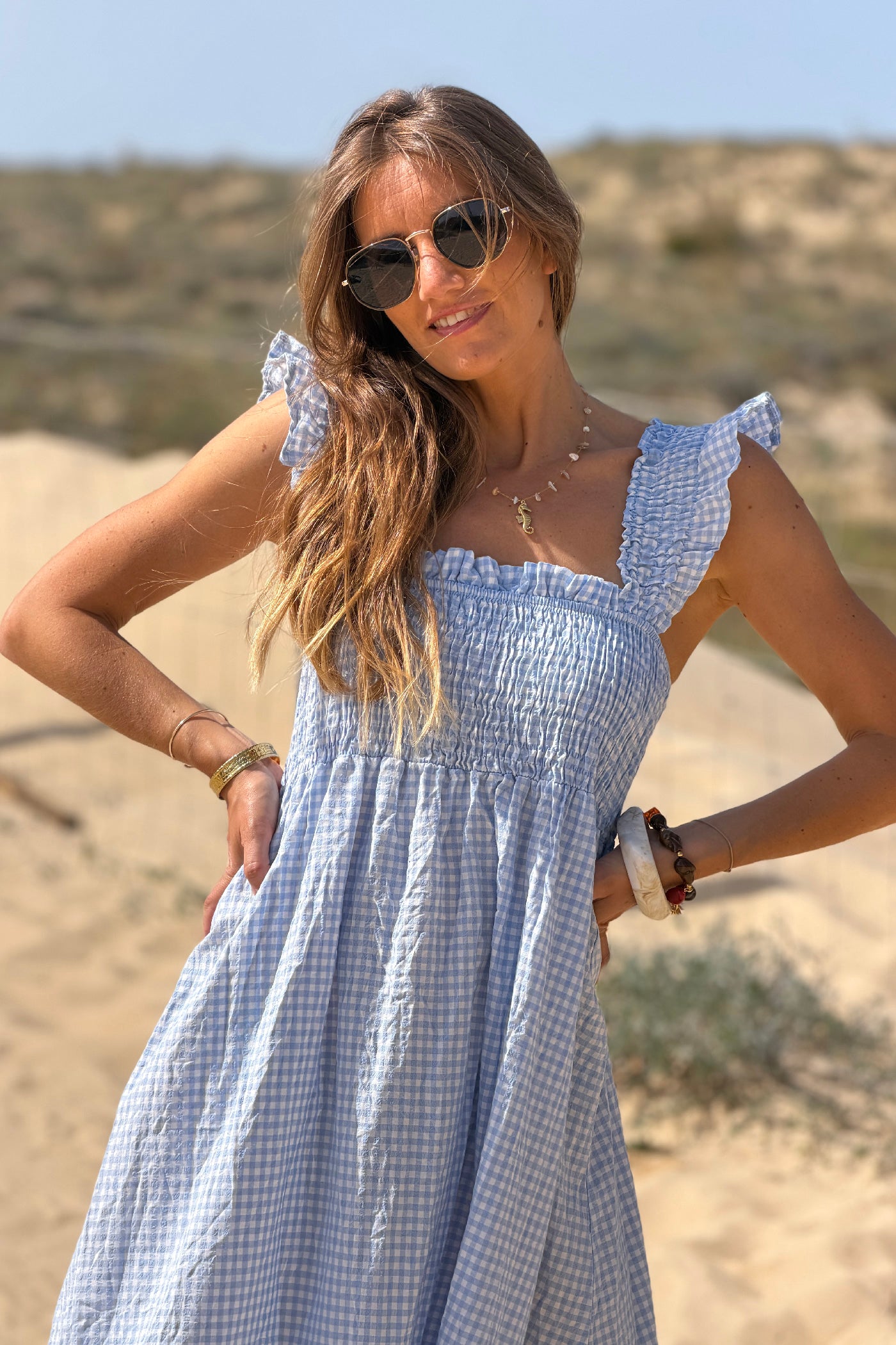 Robe à bretelles imprimé carreaux vichy bleus col élastique smocke