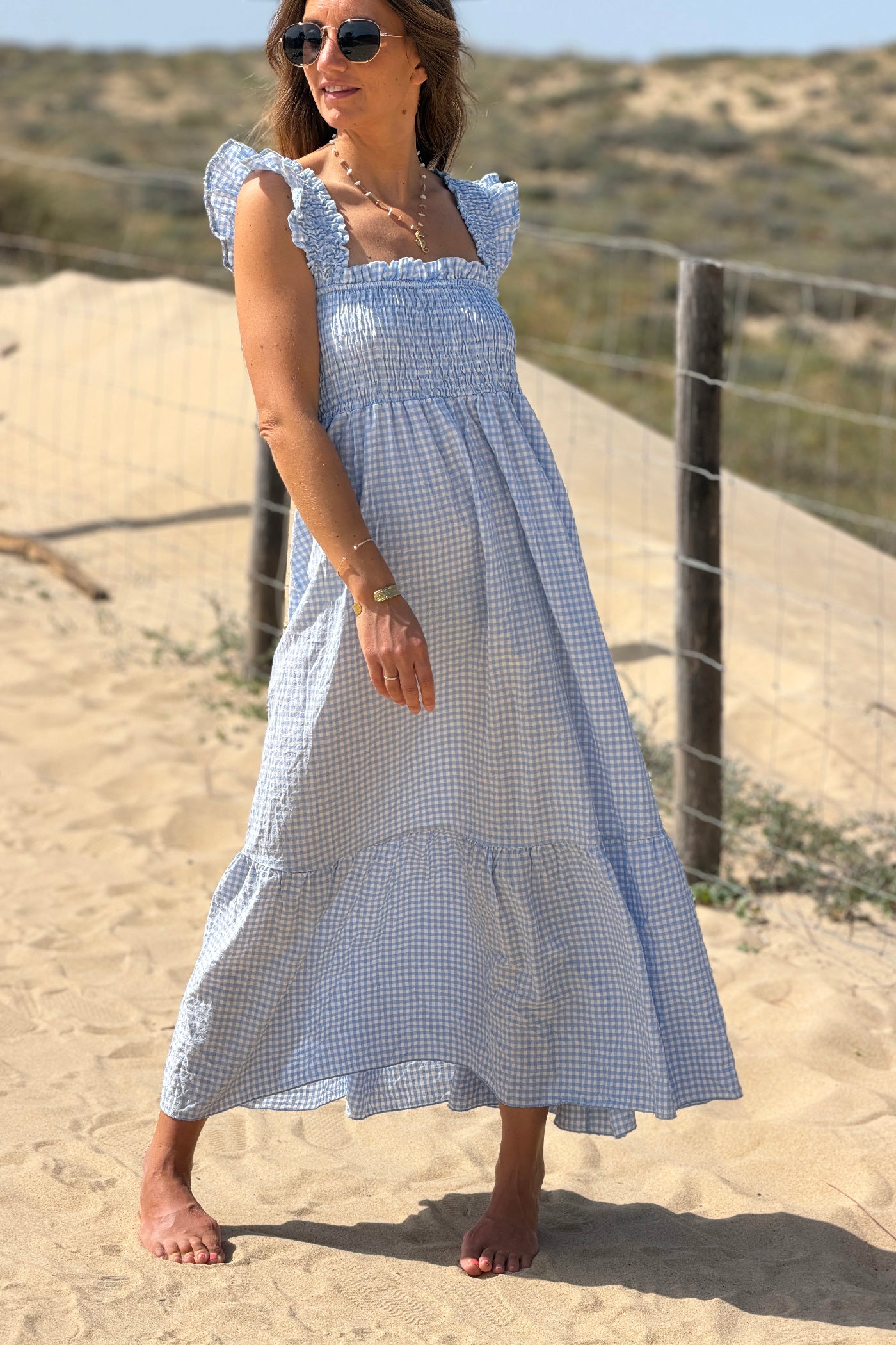 Robe à bretelles imprimé carreaux vichy bleus col élastique smocke