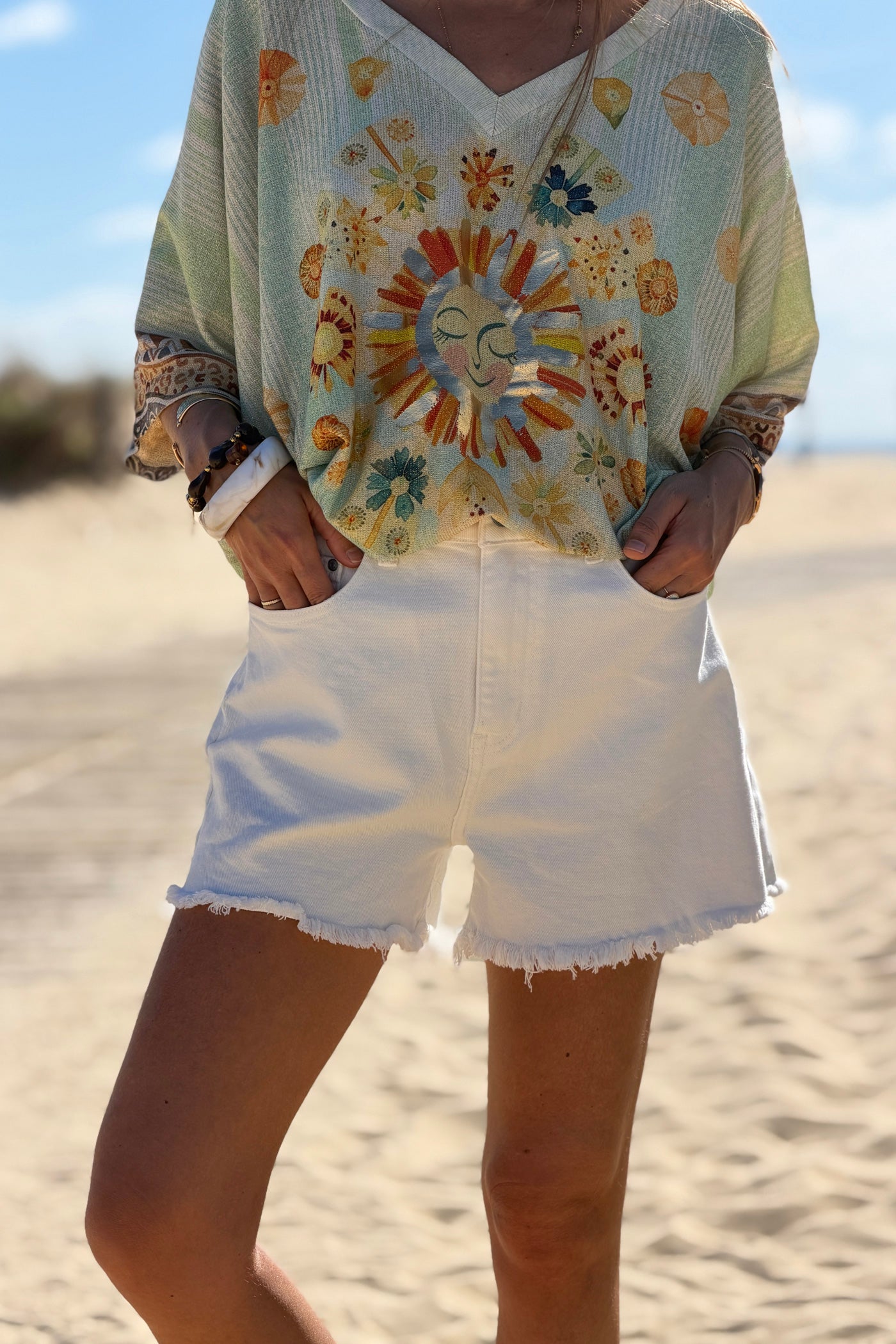 Short en jean blanc cassé stretch détails finitions franges