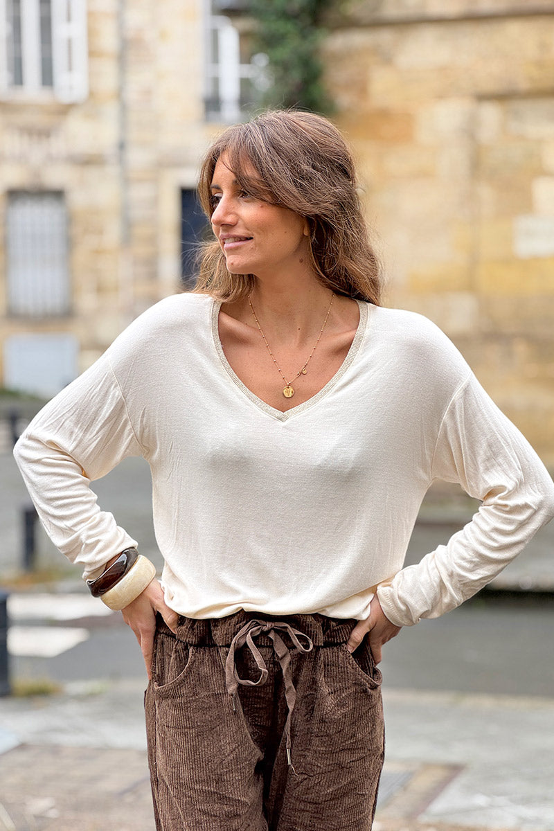 Top beige en jersey stretch col v brillant