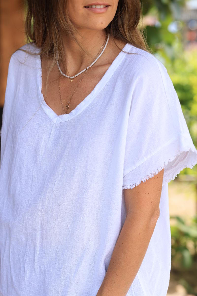 White woven cotton top with frayed hems detail