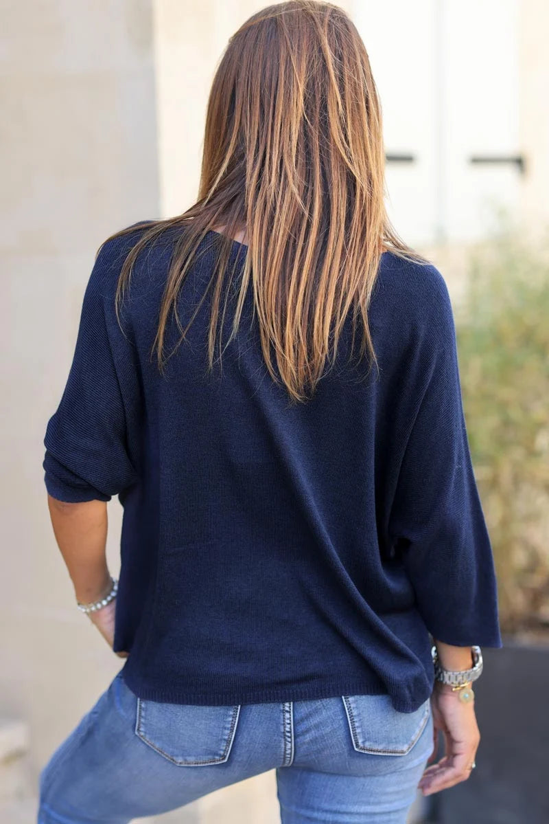 Navy blue jersey top with batwing sleeves
