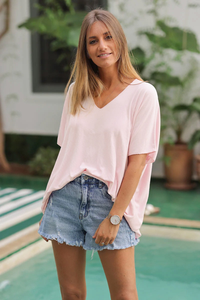 Top fluido rosa palo confort y elástico con cuello de pico