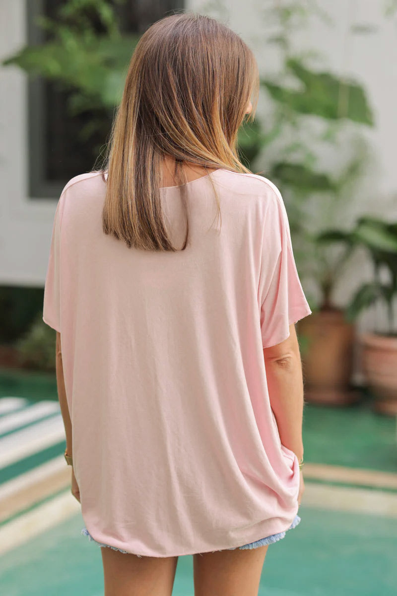 Top fluido rosa palo confort y elástico con cuello de pico