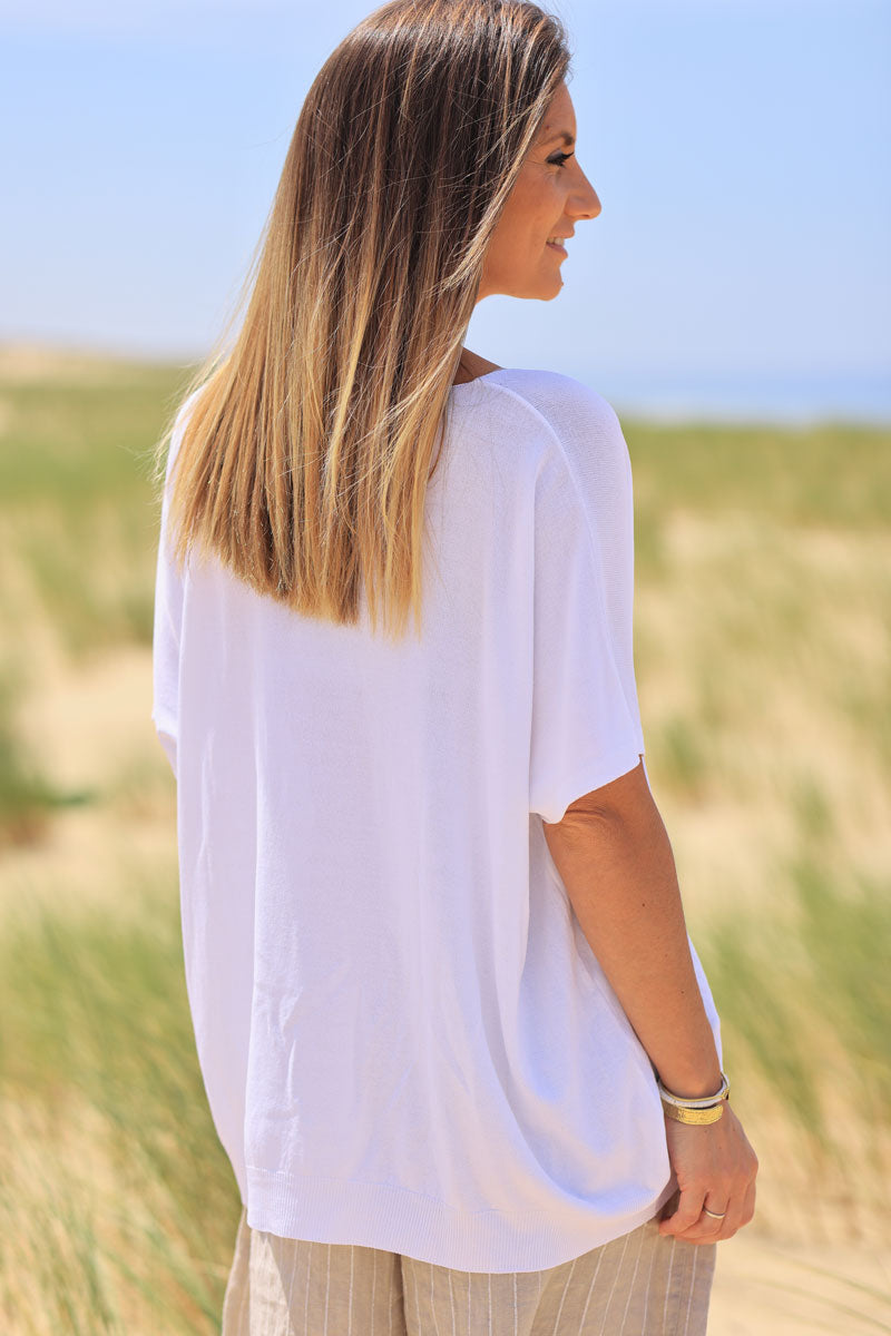 White oversized fine knit t-shirt with short sleeves