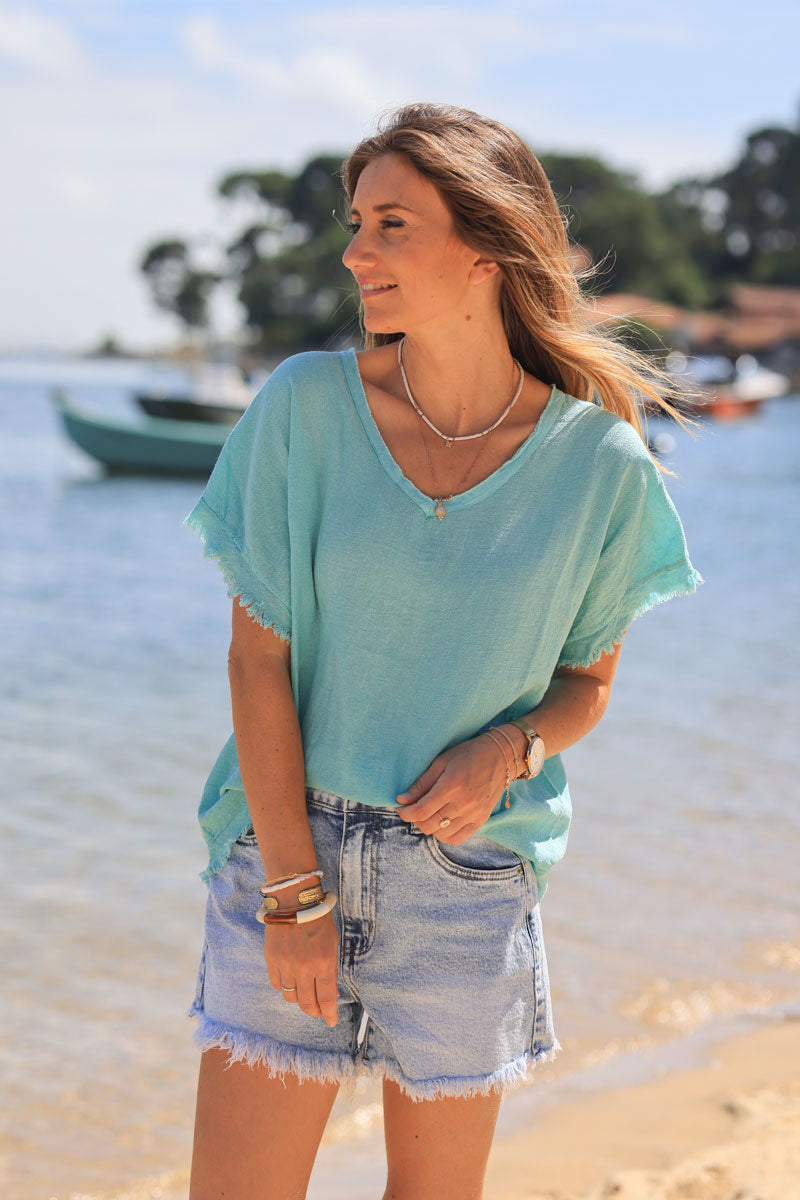Turquoise woven cotton top with frayed hems detail