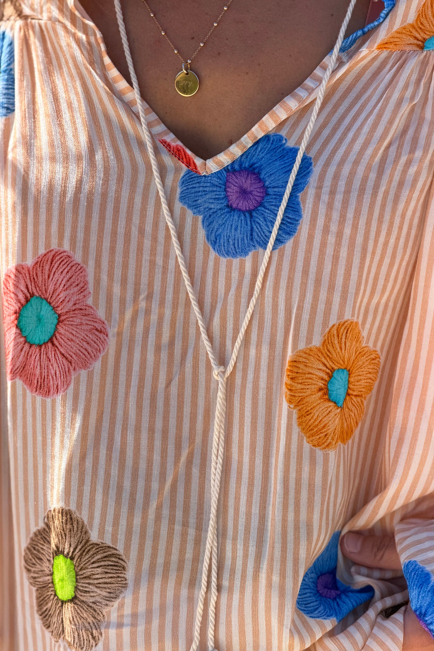 Floaty semi-sheer blouse with orange stripes and colourful flower print