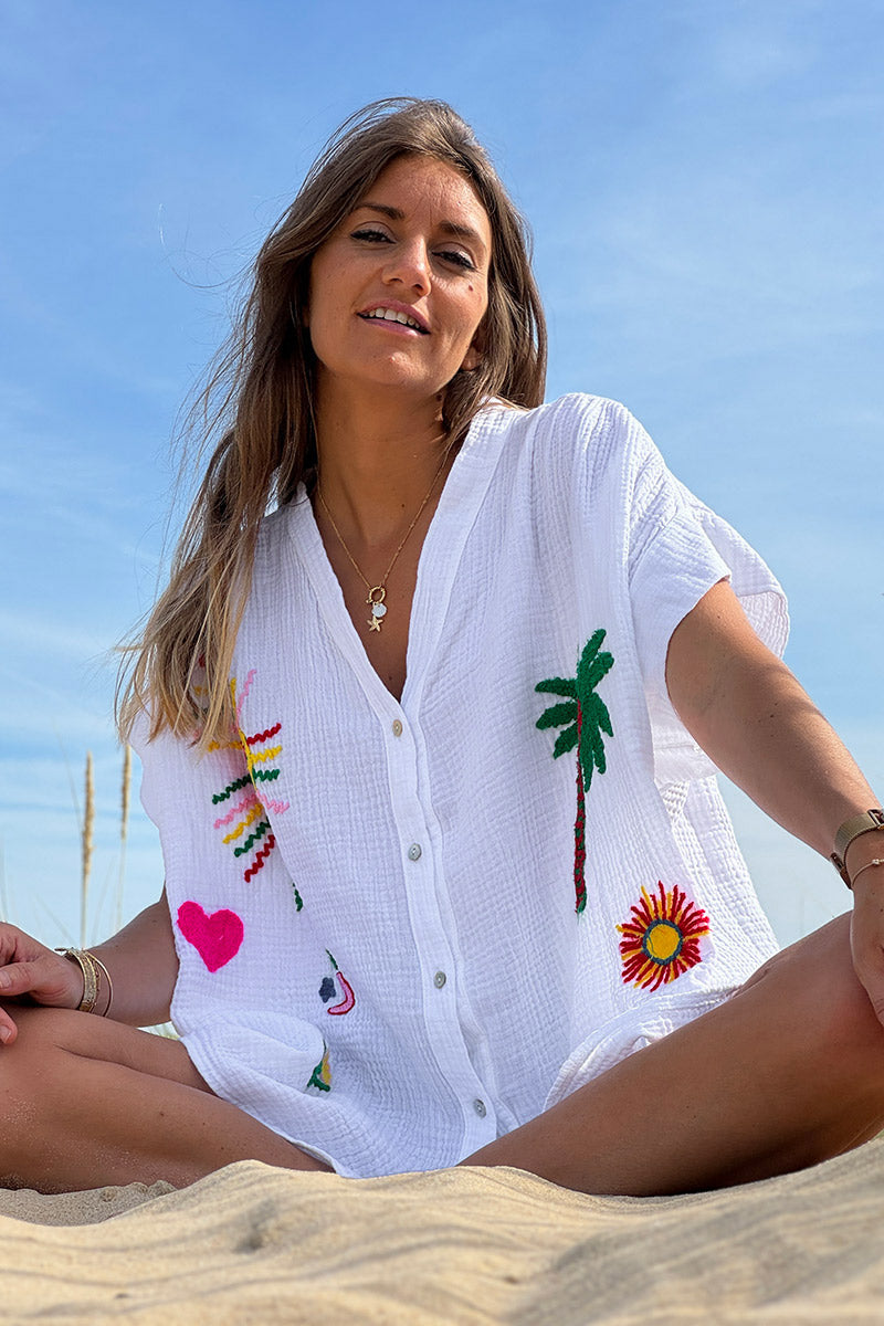 Tunique blanche à boutons en gaze de coton broderie symboles été colorés