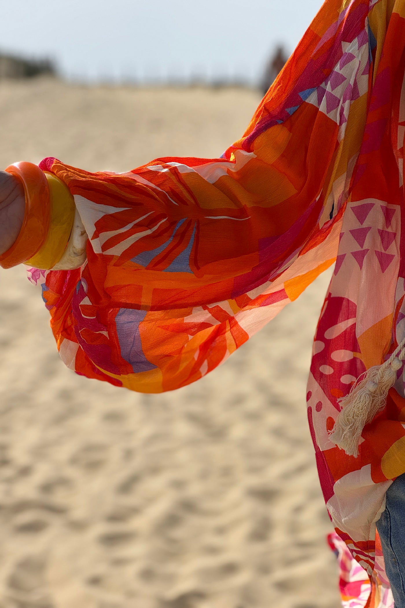 Blouse fluide imprimé graphique orange manches bouffantes