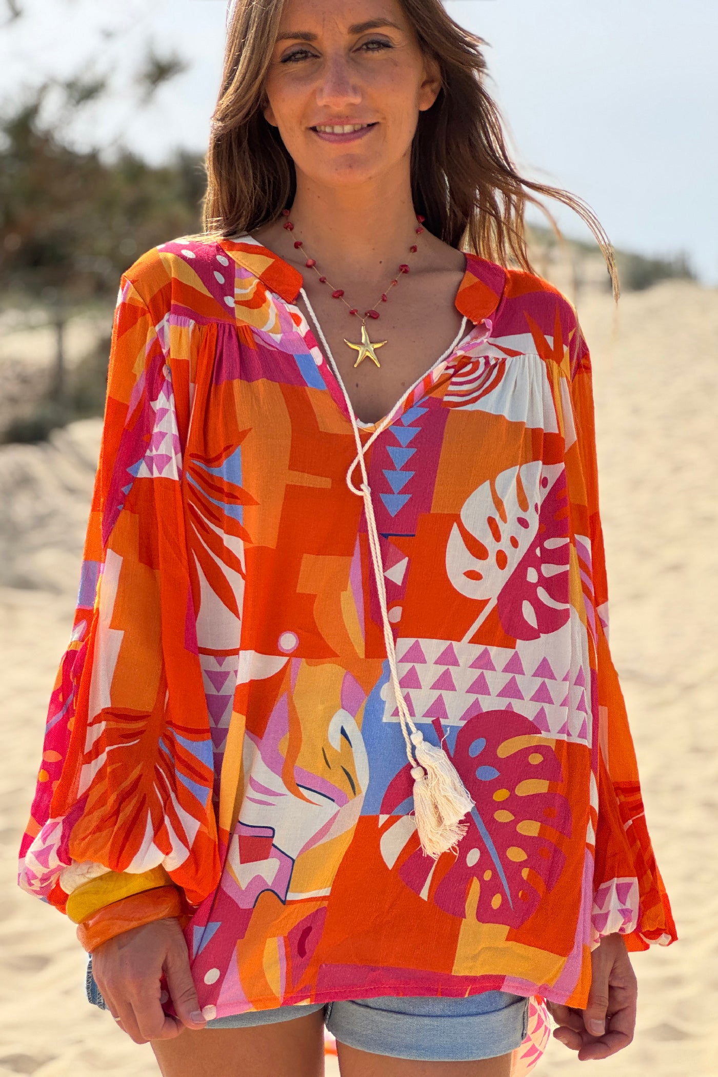 Blouse fluide imprimé graphique orange manches bouffantes