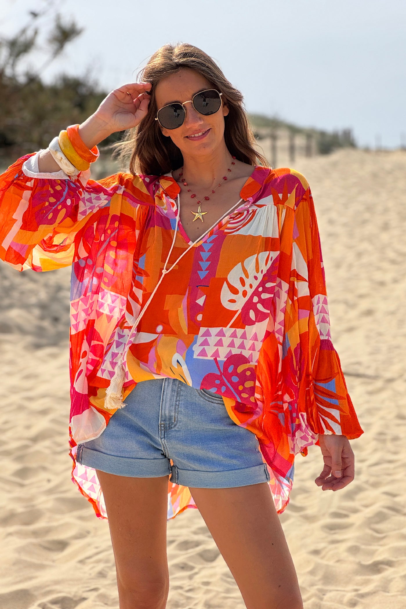 Blouse fluide imprimé graphique orange manches bouffantes
