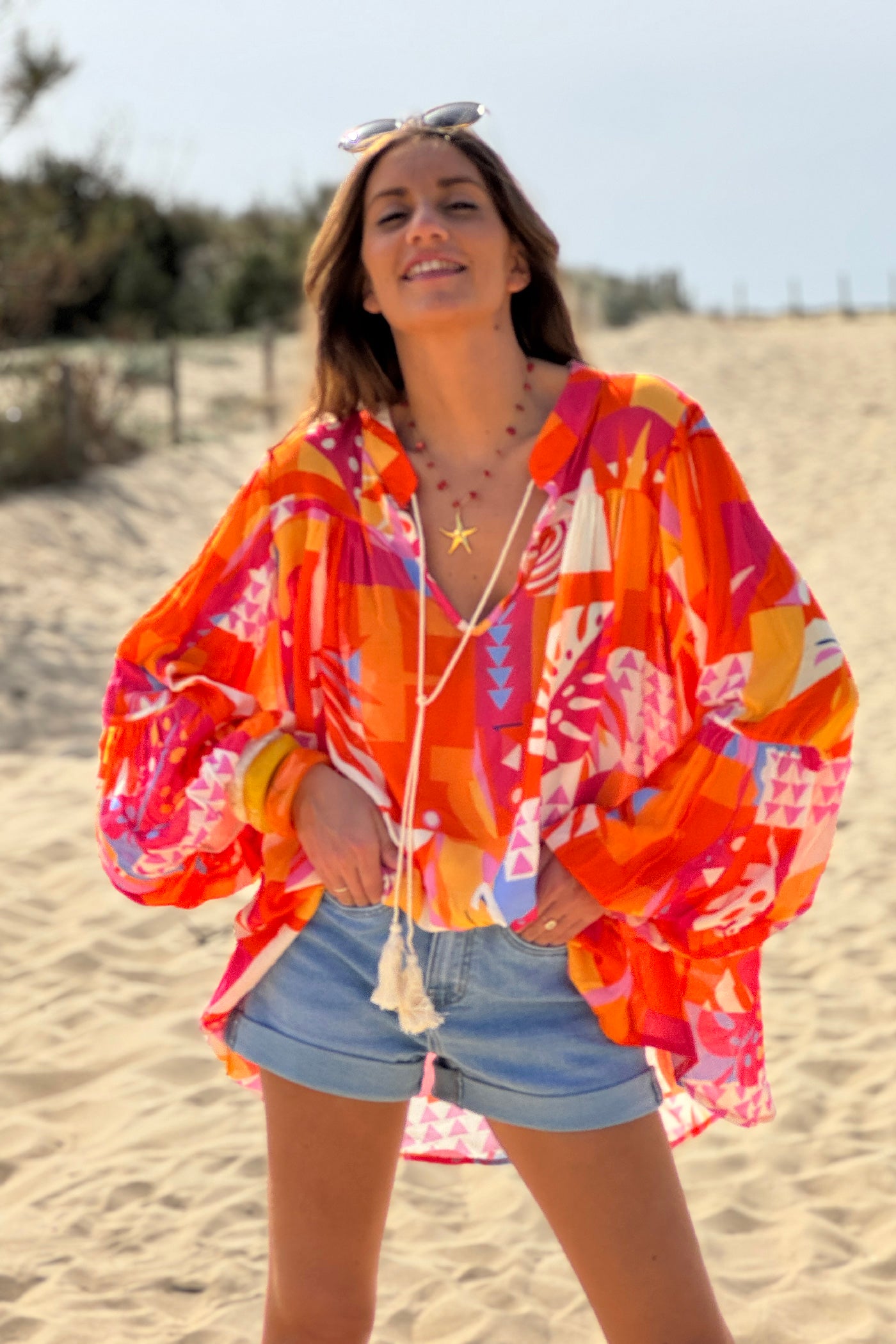 Blouse fluide imprimé graphique orange manches bouffantes