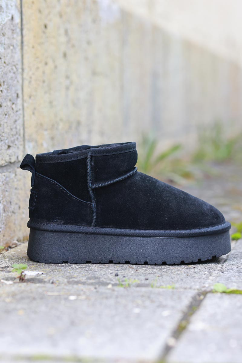 Botas bajas de piel con plataforma forradas en pelo negras