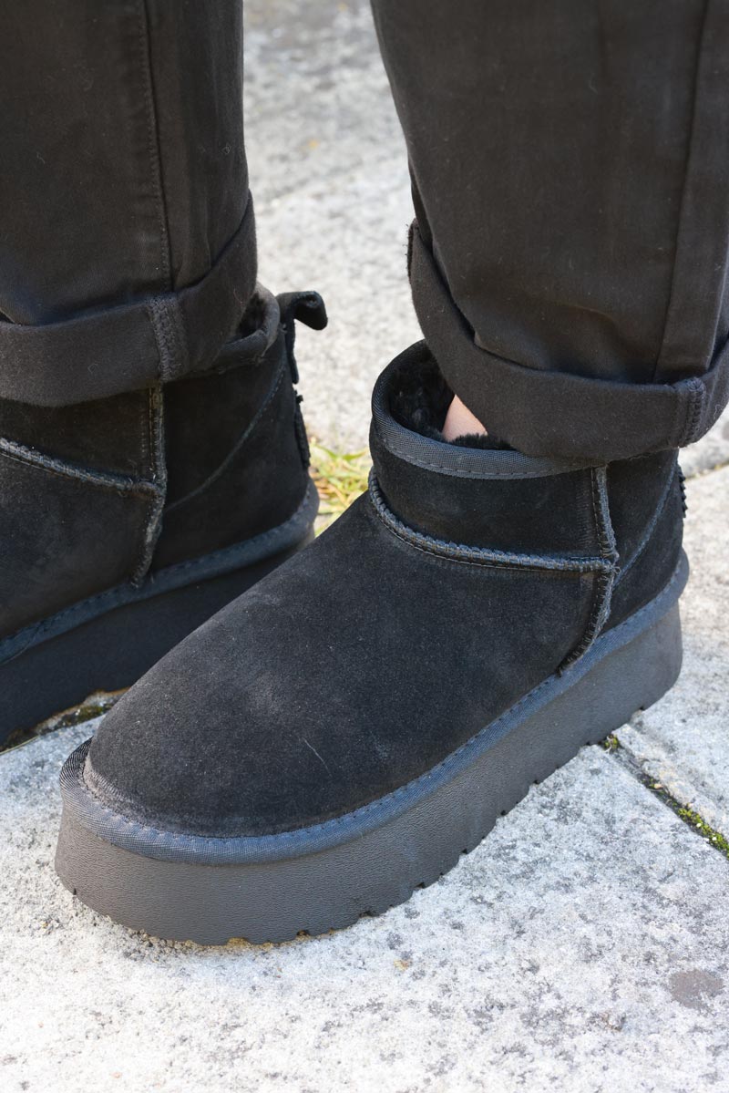 Botas bajas de piel con plataforma forradas en pelo negras