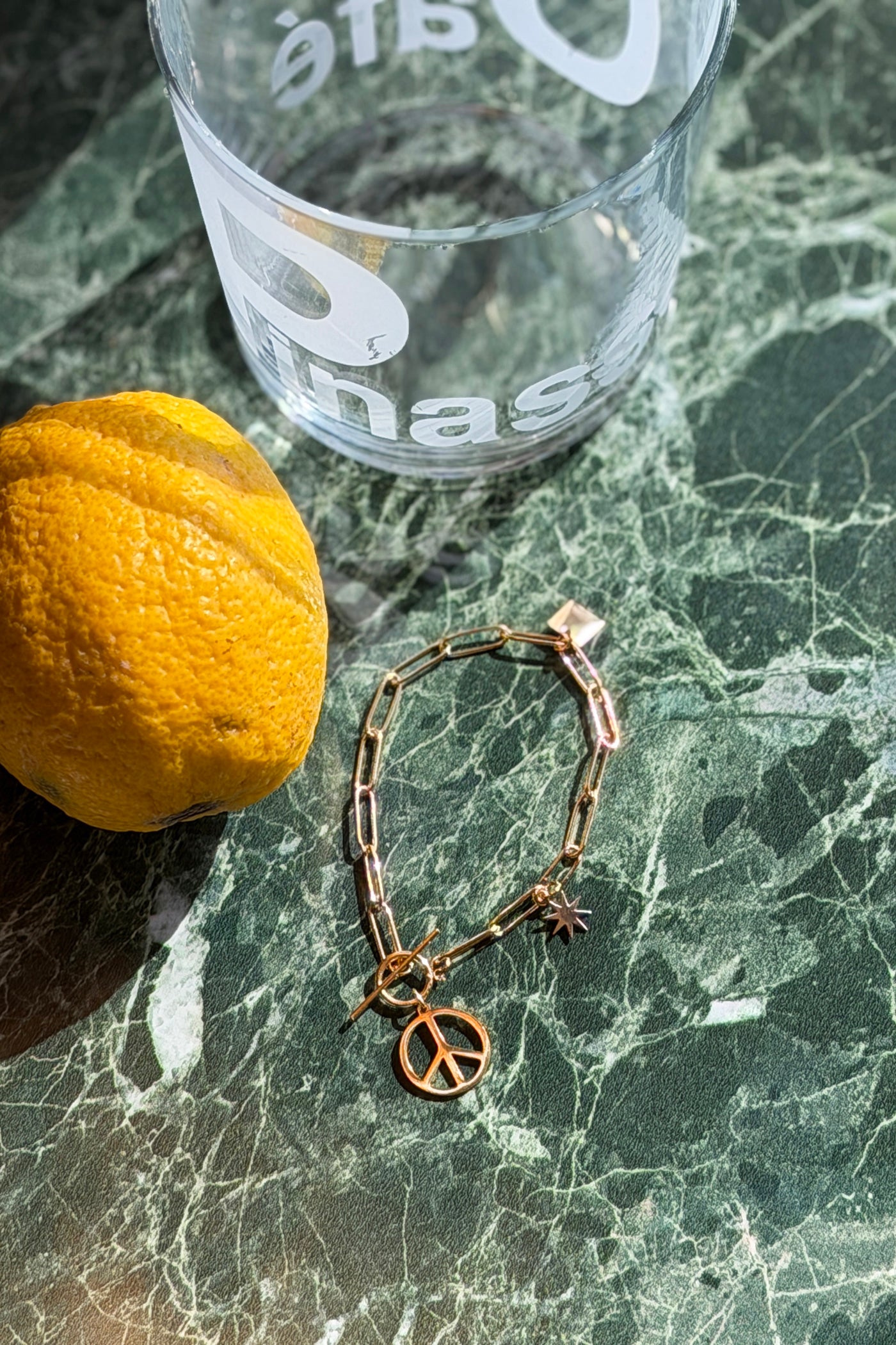 Paperlink gold bracelet with peace and love charm