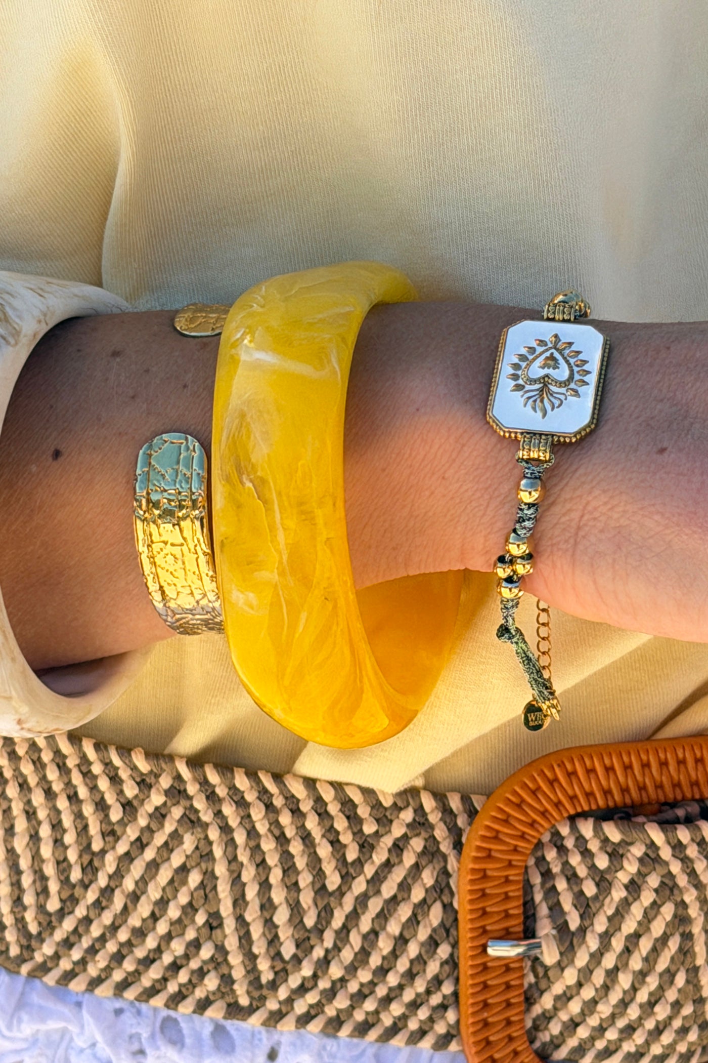 White Enamel Plaque and Gold Bead Bracelet