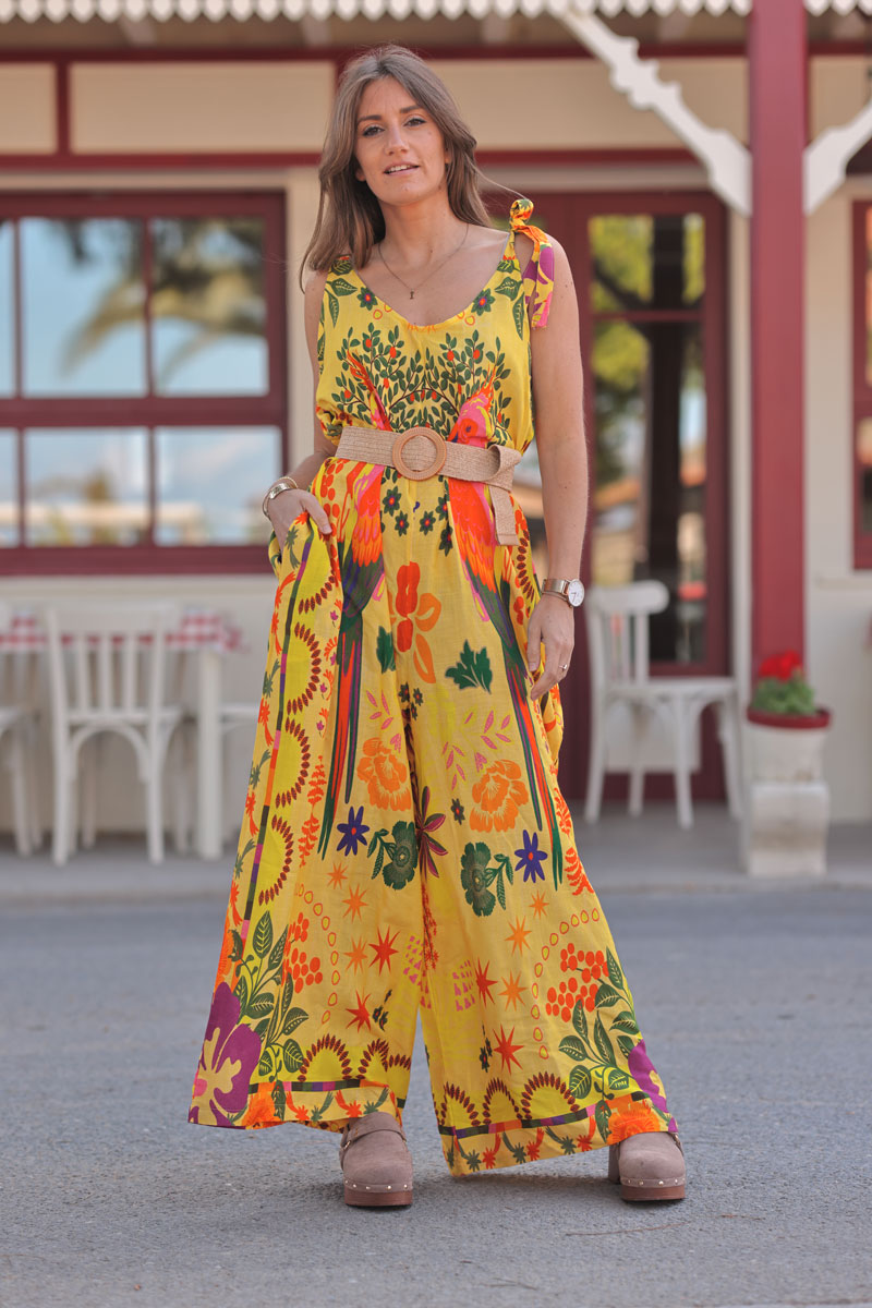Combi pantalon jaune à bretelles nœuds imprimé perroquets et fleurs colorées