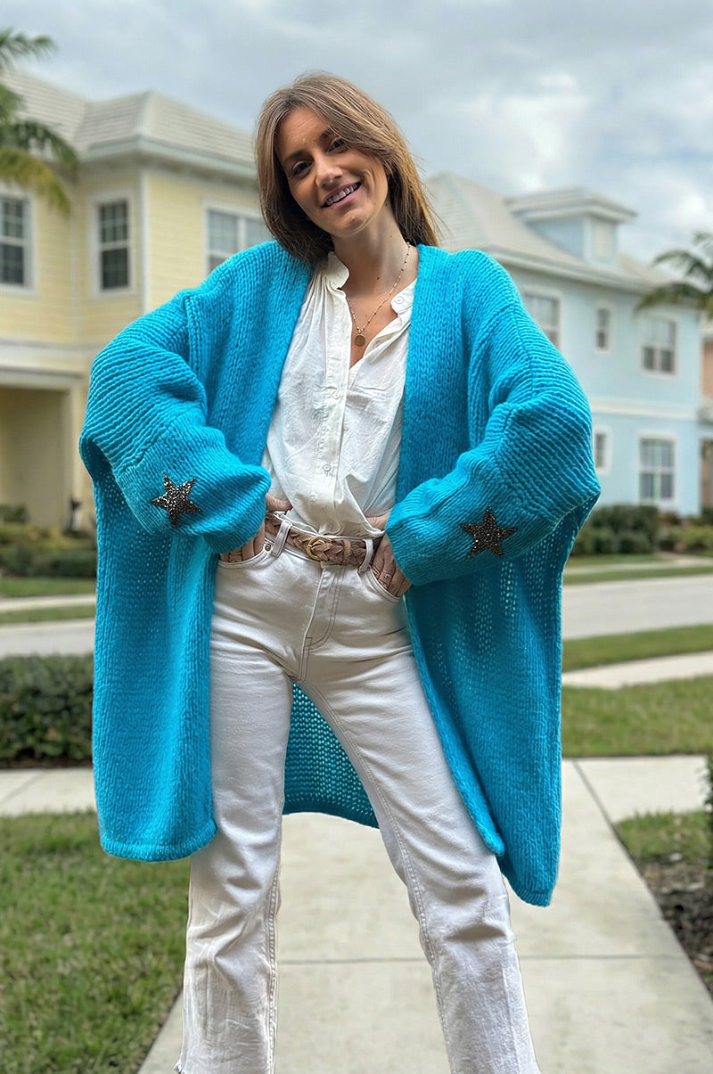 Gilet turquoise mi long grosses mailles étoile strass manches