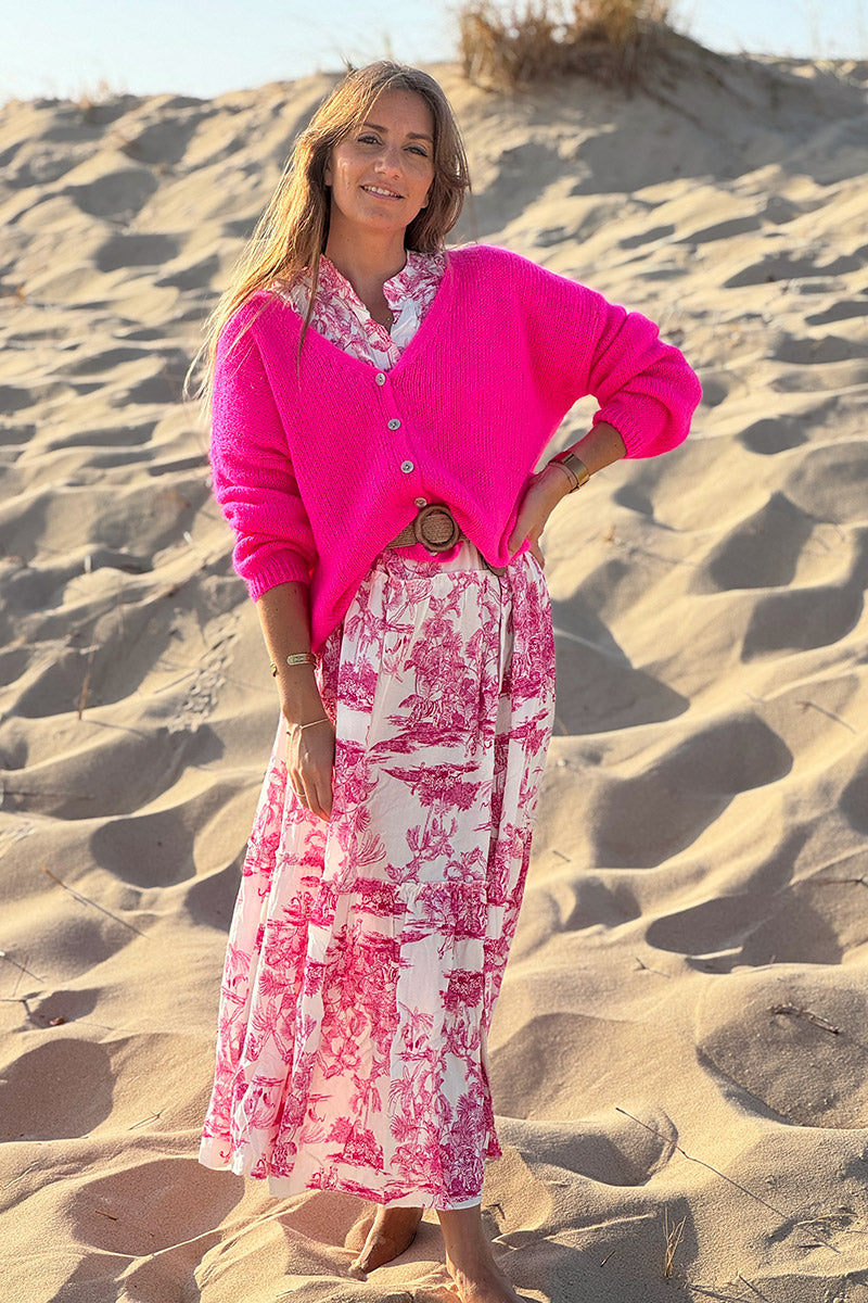 Cárdigan liso fucsia neón de punto fino con pequeños botones perlados