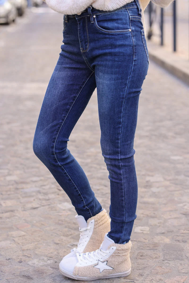 Jean basique délavé foncé coupe slim finitions franges