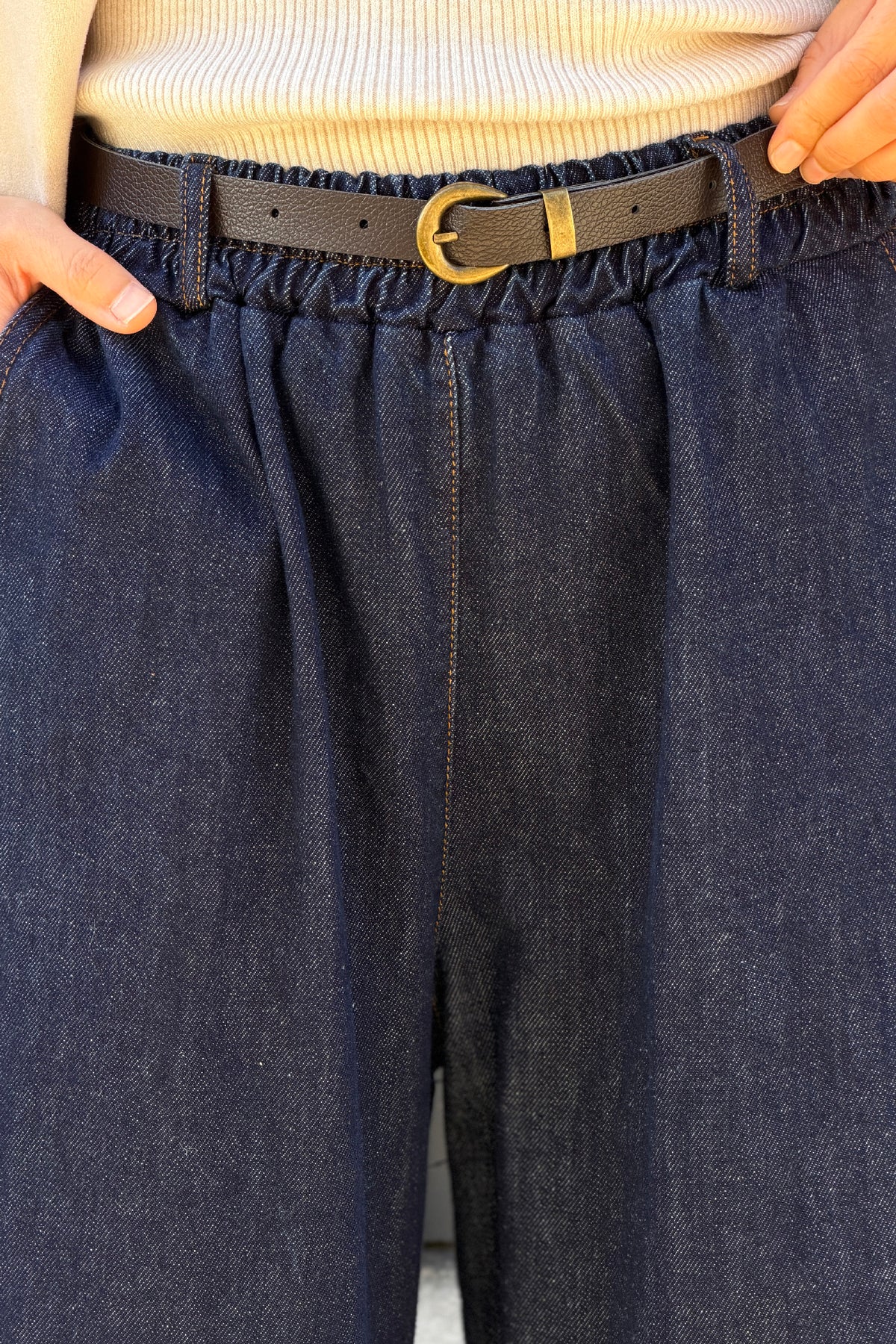 Jean brut wide leg détail franges taille élastique avec ceinture simili