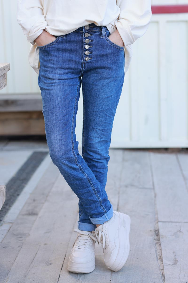 Medium Wash Button-Fly Tapered Skinny Jeans