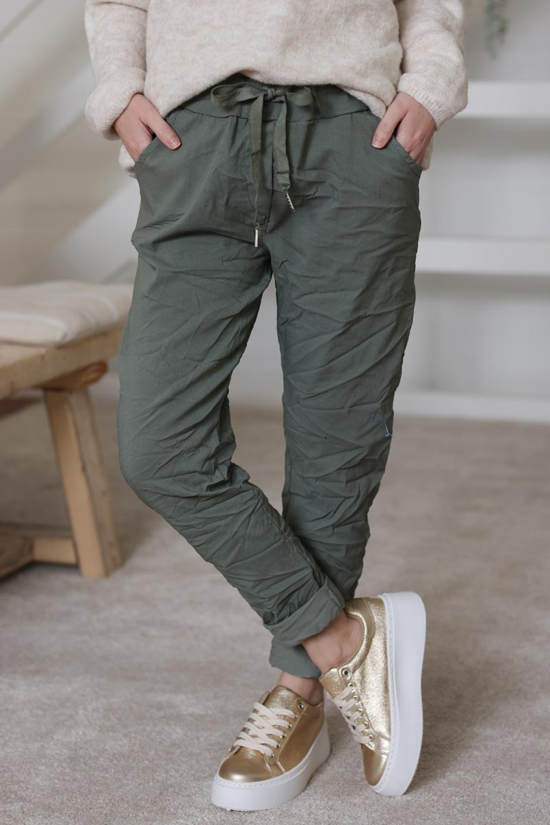 Olive comfort and stretch fabric pants with a glitter star