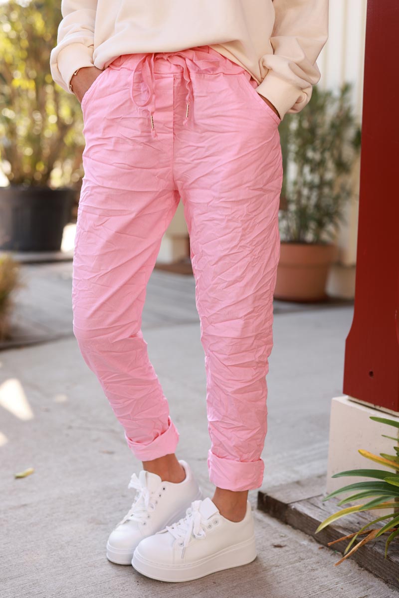 Pink comfort and stretch fabric pants with a glitter star