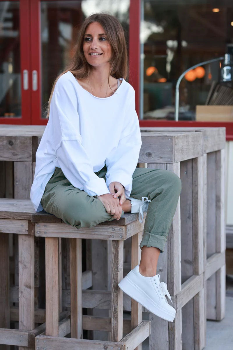 Sage comfort and stretch fabric pants with a glitter star