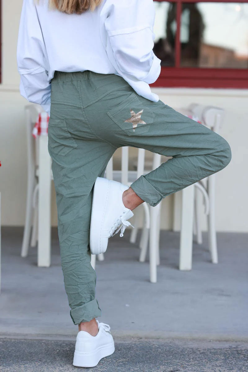 Sage comfort and stretch fabric pants with a glitter star