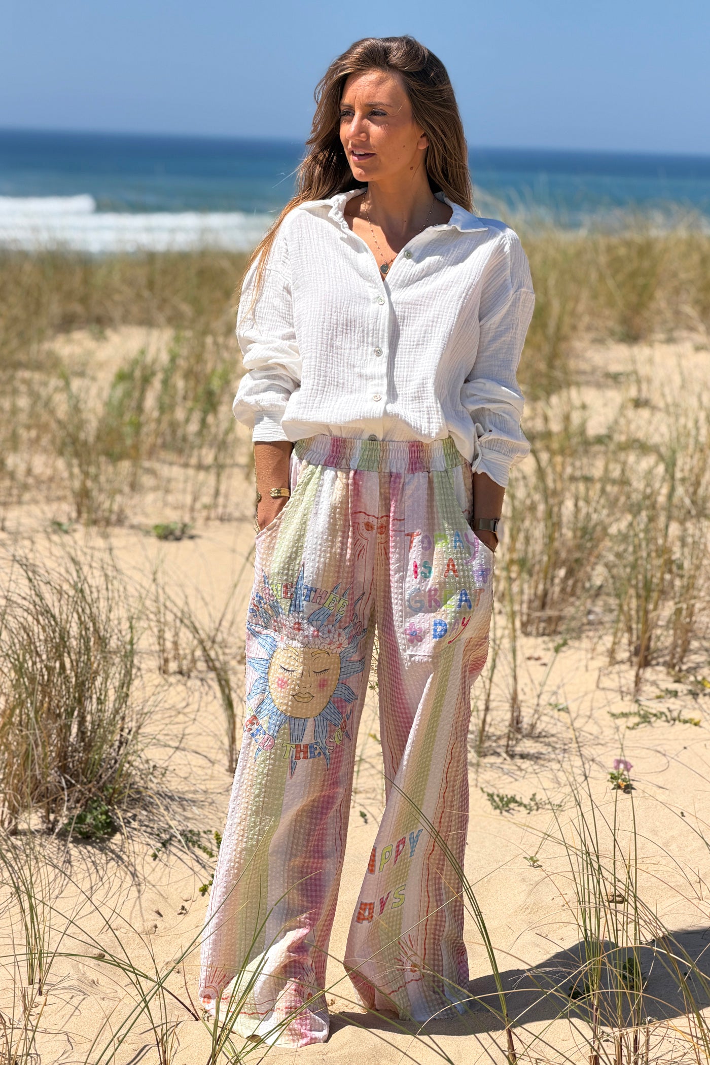 Pantalon large en seersucker rose motif soleil fleuri Happy Days taille élastique