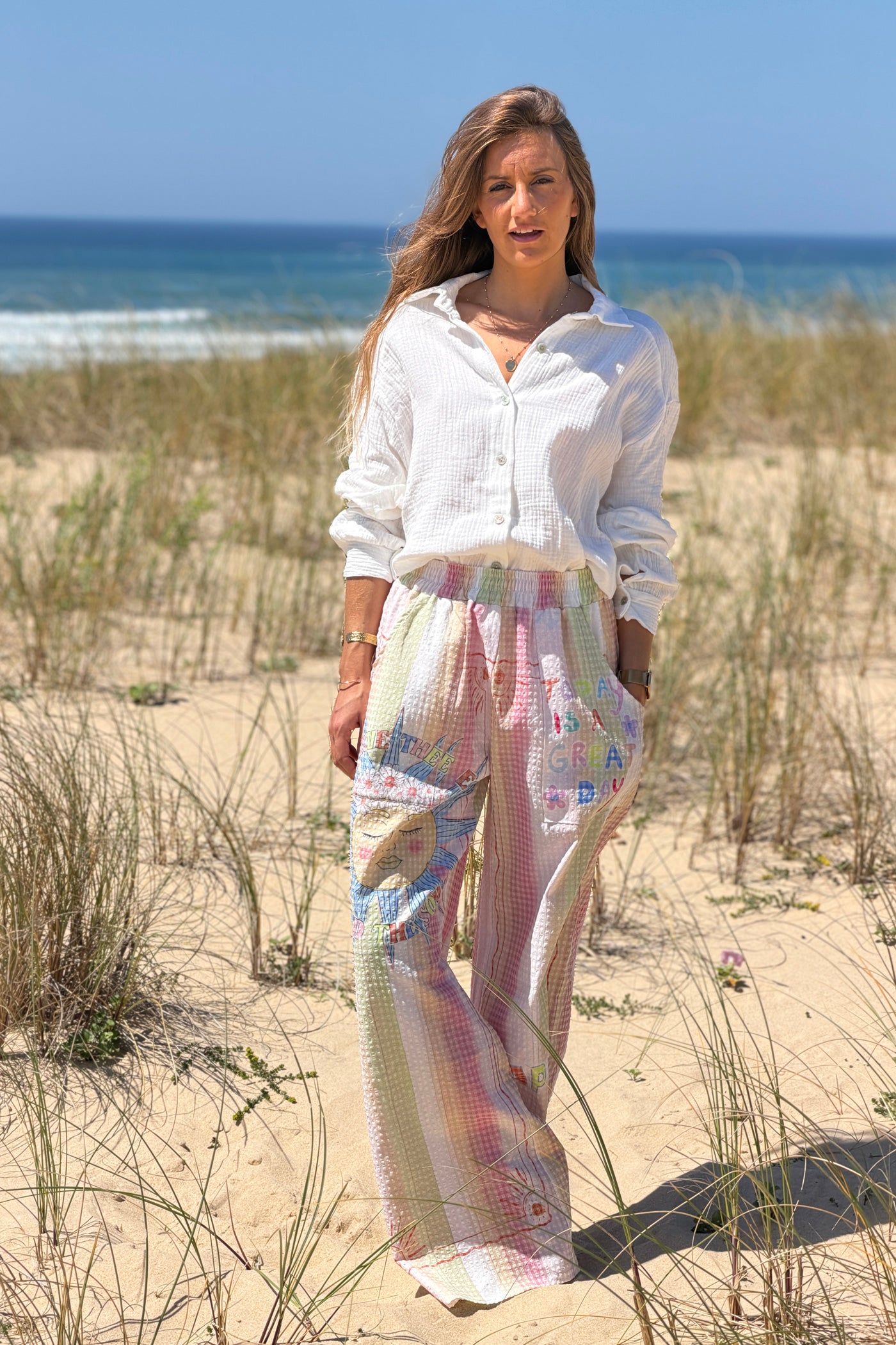 Pantalon large en seersucker rose motif soleil fleuri Happy Days taille élastique