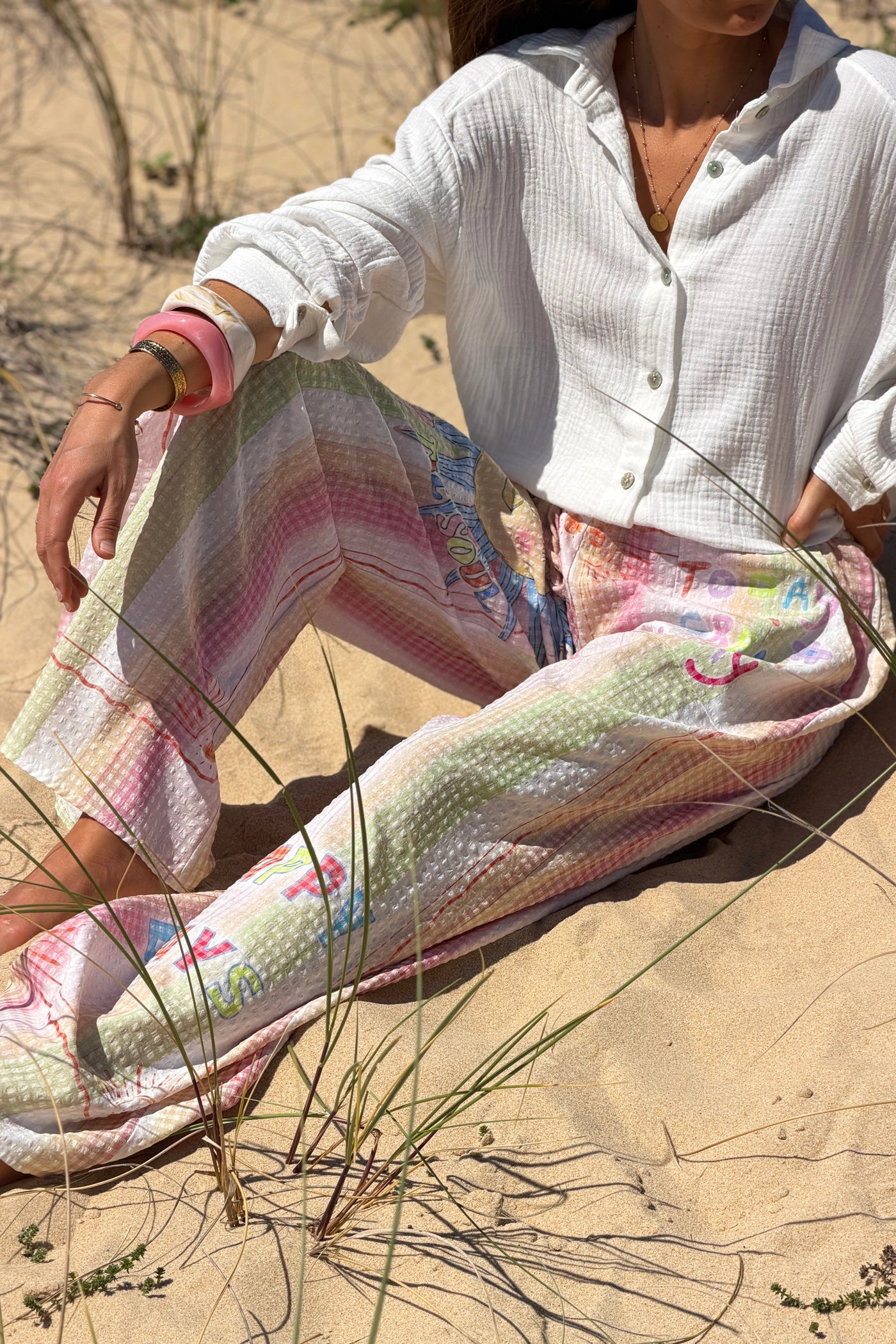 Pantalon large en seersucker rose motif soleil fleuri Happy Days taille élastique
