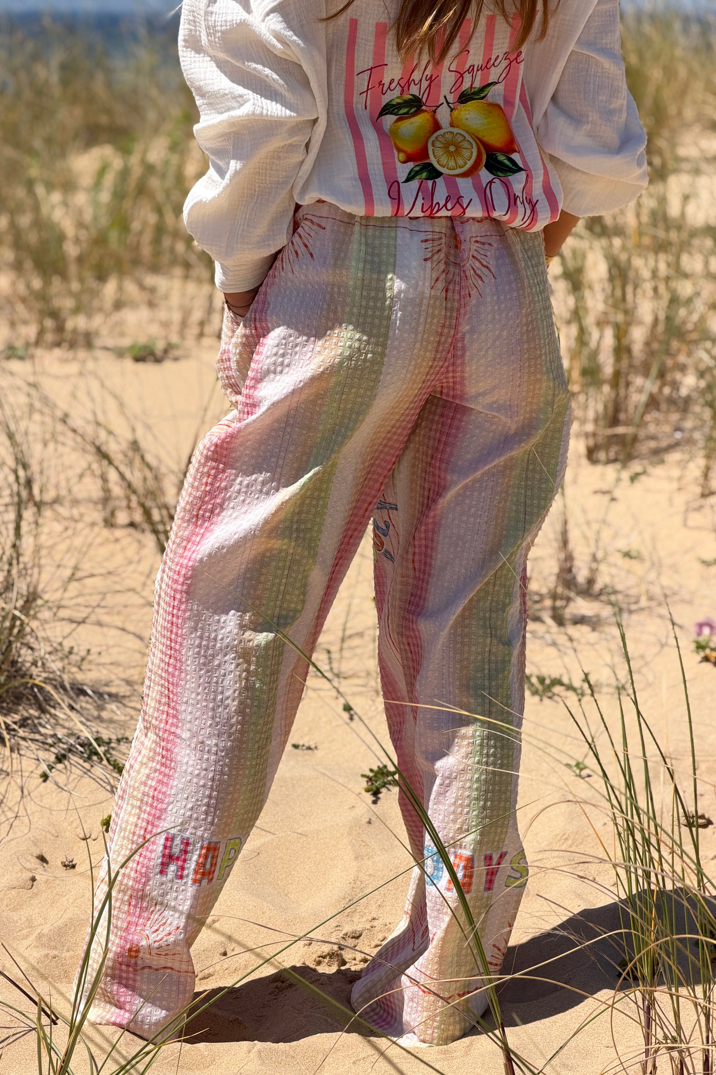 Pantalon large en seersucker rose motif soleil fleuri Happy Days taille élastique