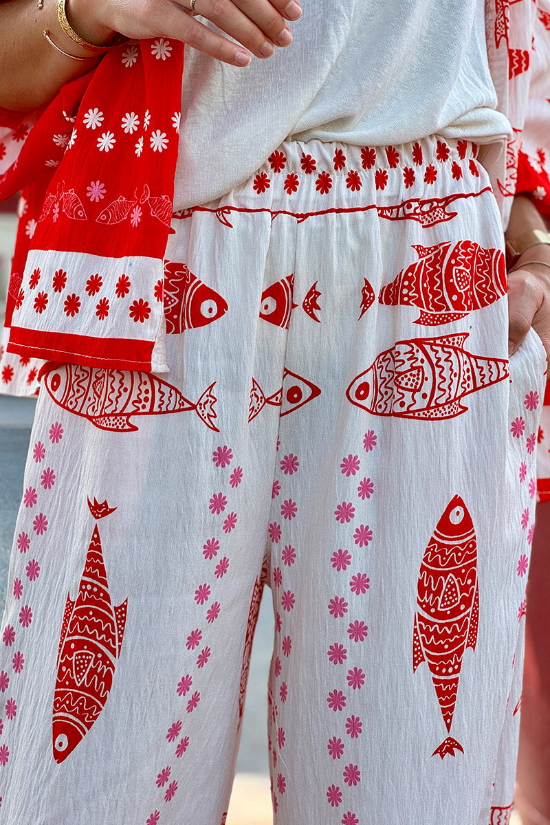 Pantalon souple blanc cassé imprimé poissons sardines rouges ceinture élastique