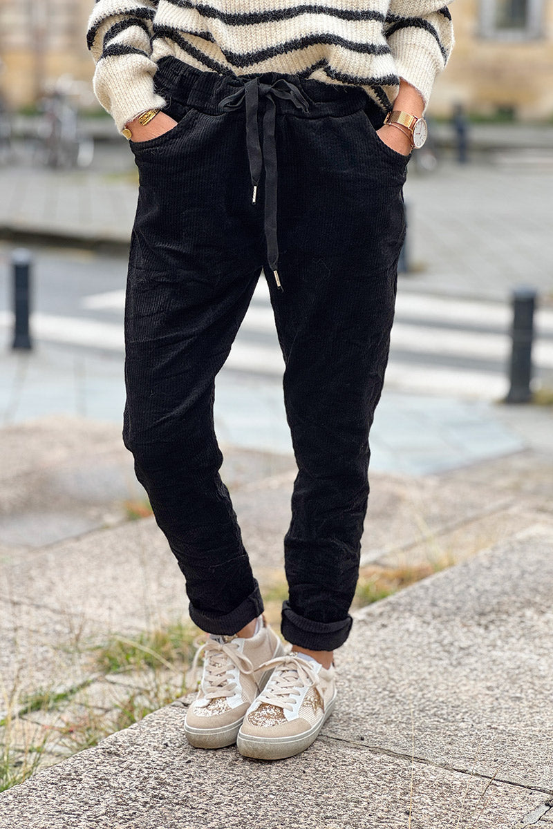 Pantalon stretch noir et confort en velours côtelé à taille élastique