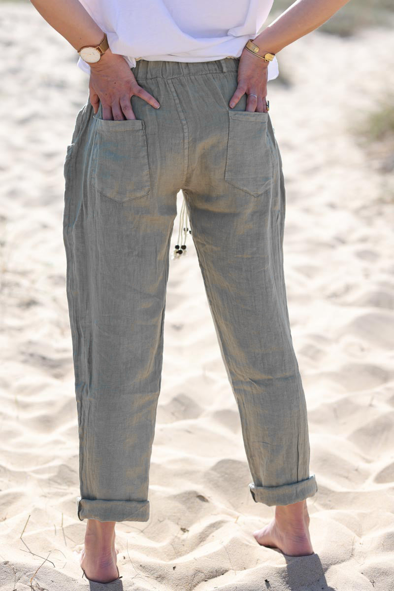 Khaki linen trousers with crochet and wooden beaded belt