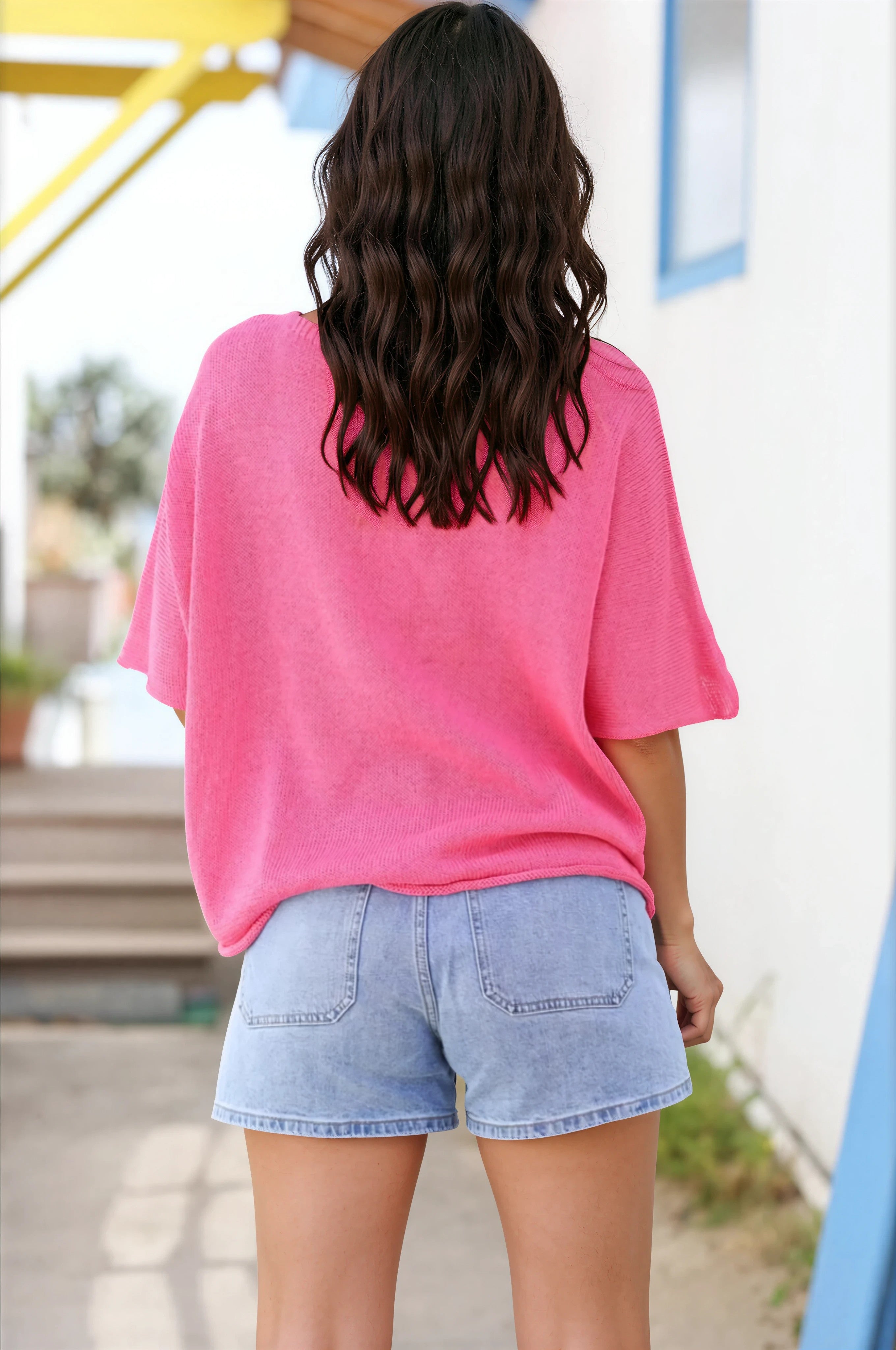 Little fuchsia cotton knit sweater with batwing sleeves and shell necklace