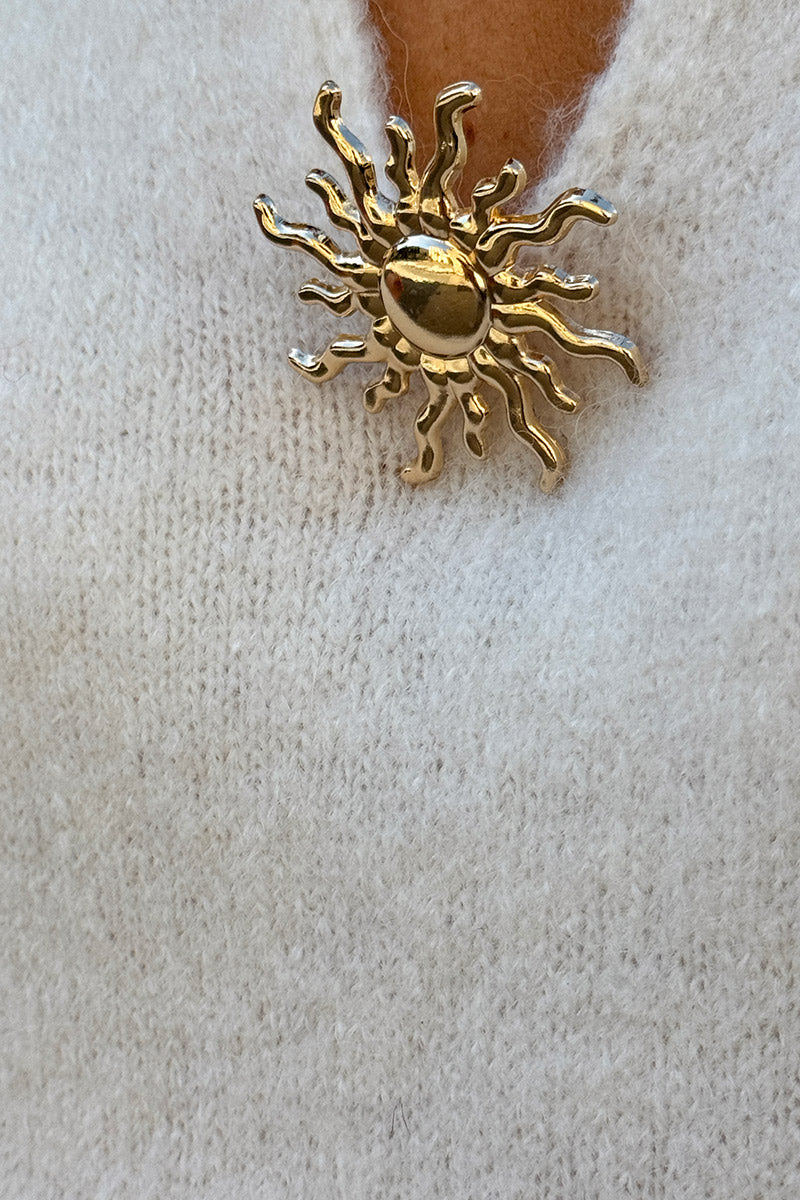 Off white Collared Fuzzy Knit Sweater with Sun Brooch