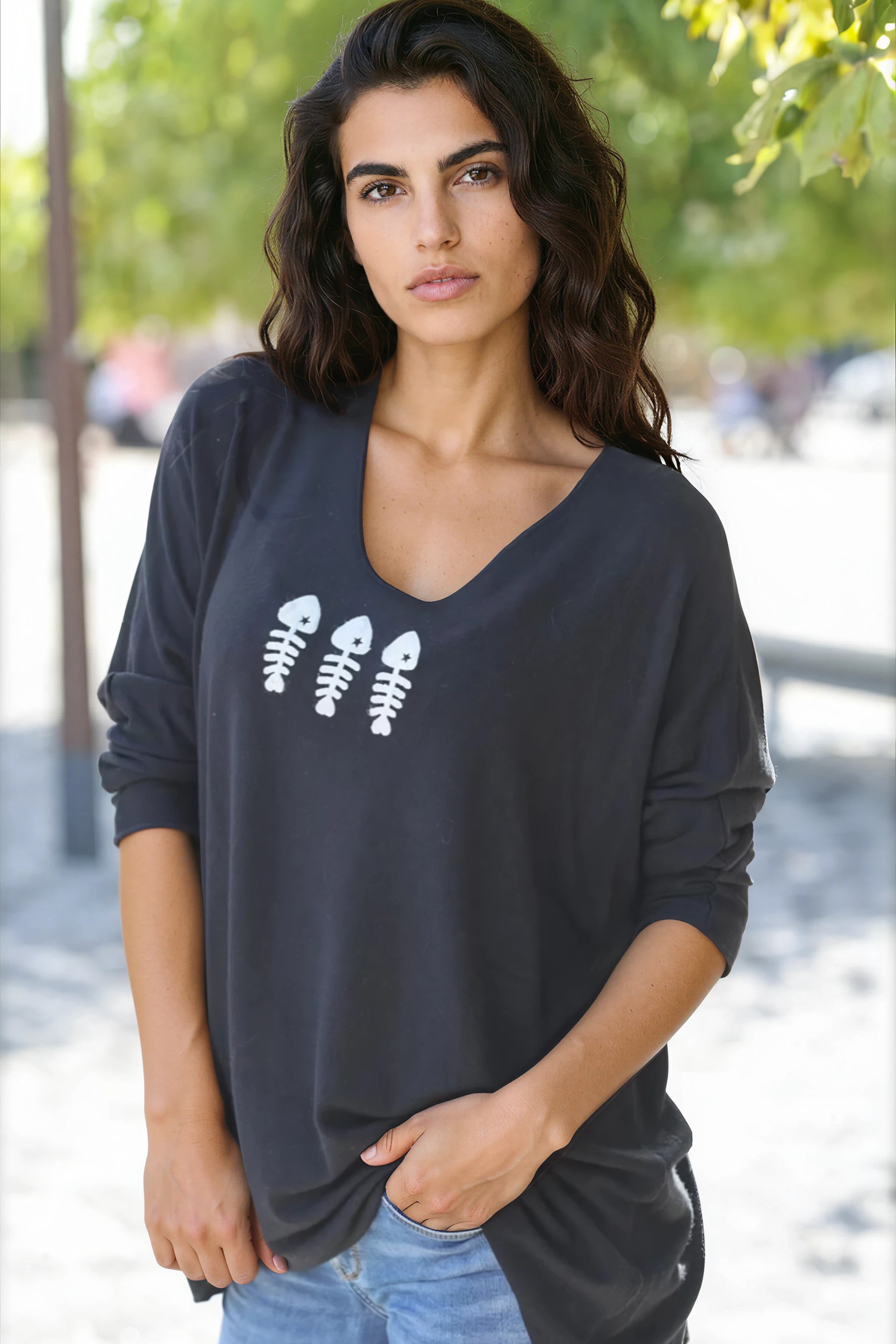 Pull jersey noir doux trio poissons